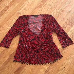 Bright red top with black beaded hem